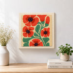 Finished red poppies artwork displayed on a wall