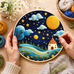 Creating the red-roof fairy house under the magical night sky wool painting by hand with a felting needle