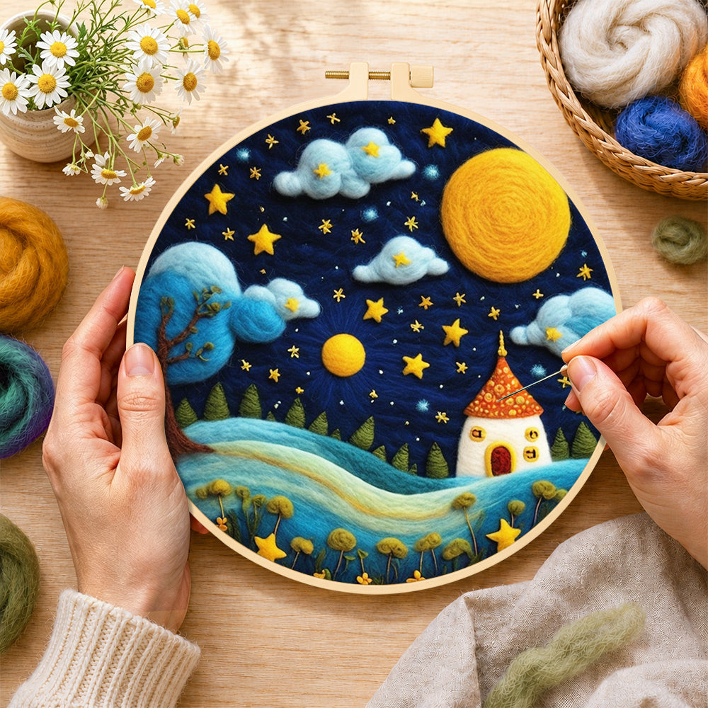Creating the red-roof fairy house under the magical night sky wool painting by hand with a felting needle