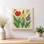 Finished red, yellow and purple tulip flowers artwork displayed on a wall