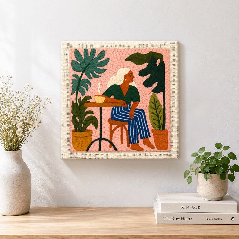 Finished relaxing woman and houseplants artwork displayed on a wall