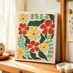 Retro ditsy botanical punch needle artwork displayed on a table