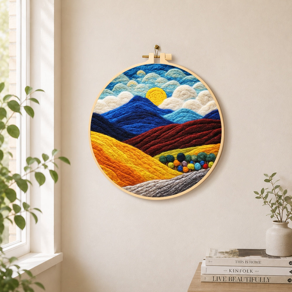 Rich autumn mountain scene needle felt wall art displayed in a bright home interior