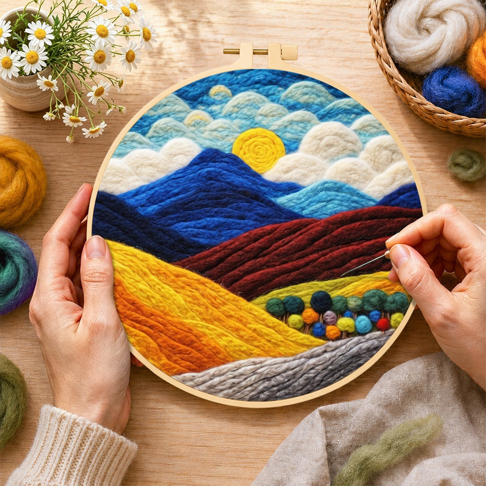 Creating the rich autumn mountain scene wool painting by hand with a felting needle