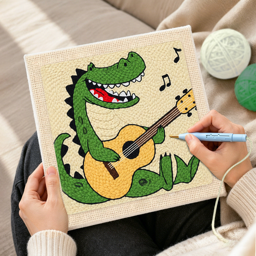 Creating handmade rockstar crocodile playing guitar punch needle artwork