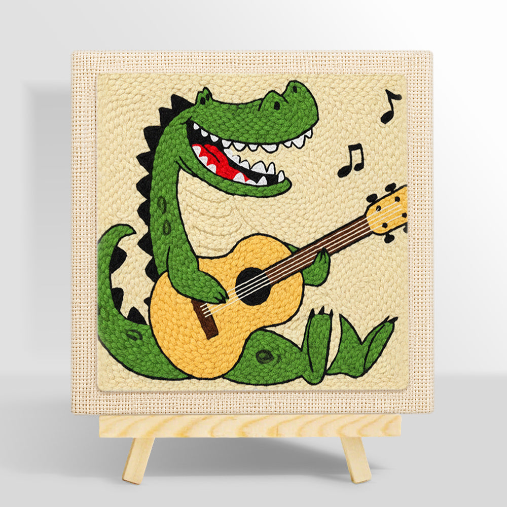Rockstar crocodile playing guitar punch needle kit for beginners