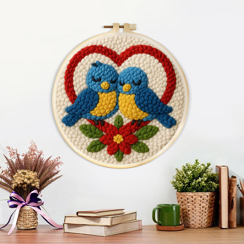 Finished romantic blue lovebirds artwork displayed on a wall