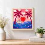 Finished romantic cat couple, heart sunset and palm trees artwork displayed on a wall