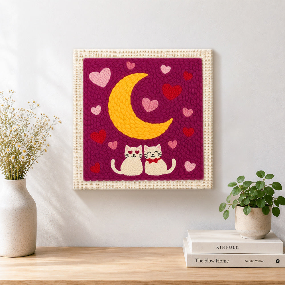 Finished romantic cat couple under moonlit night artwork displayed on a wall
