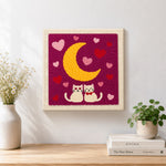 Finished romantic cat couple under moonlit night artwork displayed on a wall