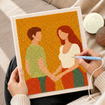 Creating handmade romantic couple holding hands punch needle artwork