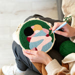 Creating handmade romantic embrace punch needle artwork