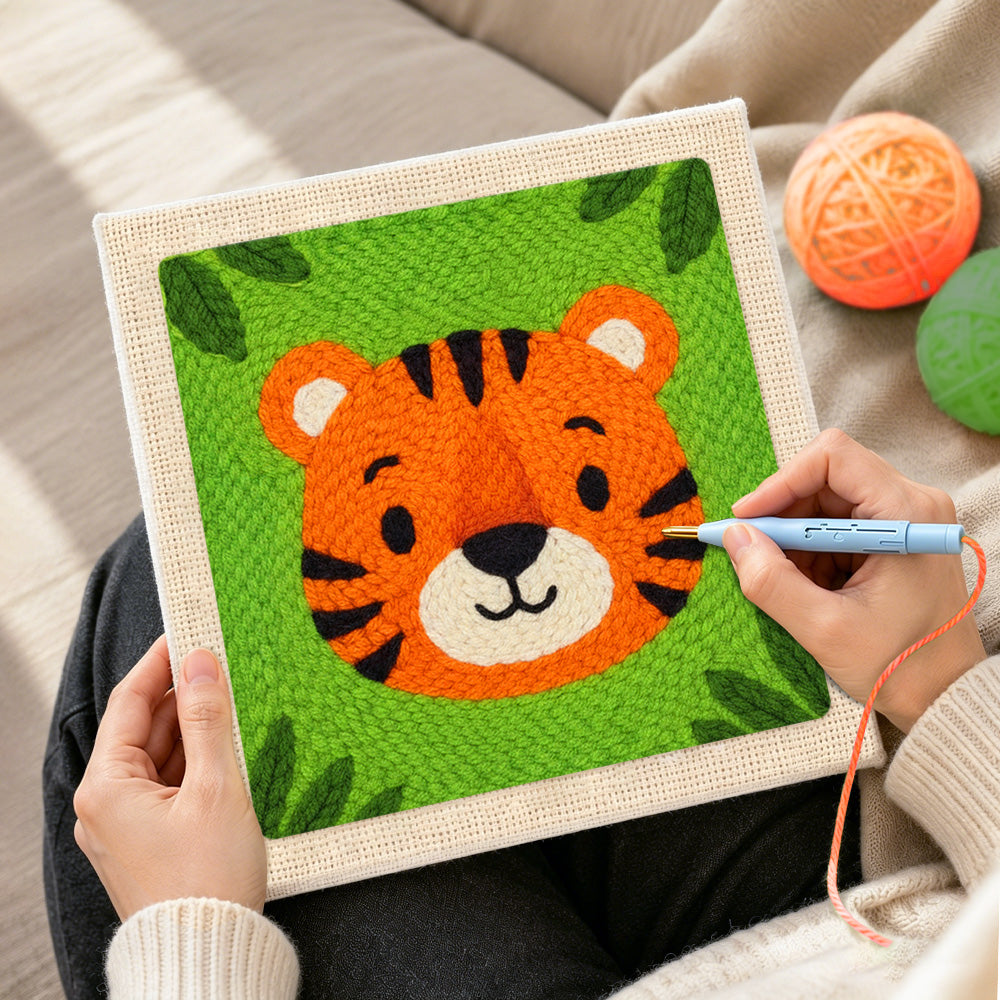 Creating handmade round and cuddly tiger face punch needle artwork