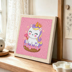 Royal unicorn on donut punch needle artwork displayed on a table