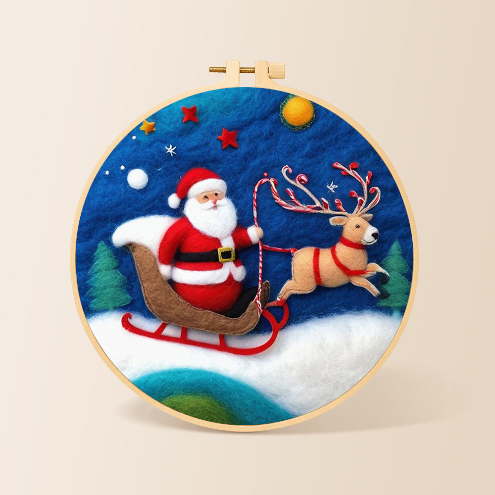 Santa in sleigh with reindeer needle felting kit for beginners with a round wooden frame