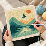 Creating handmade scenic mountain landscape punch needle artwork
