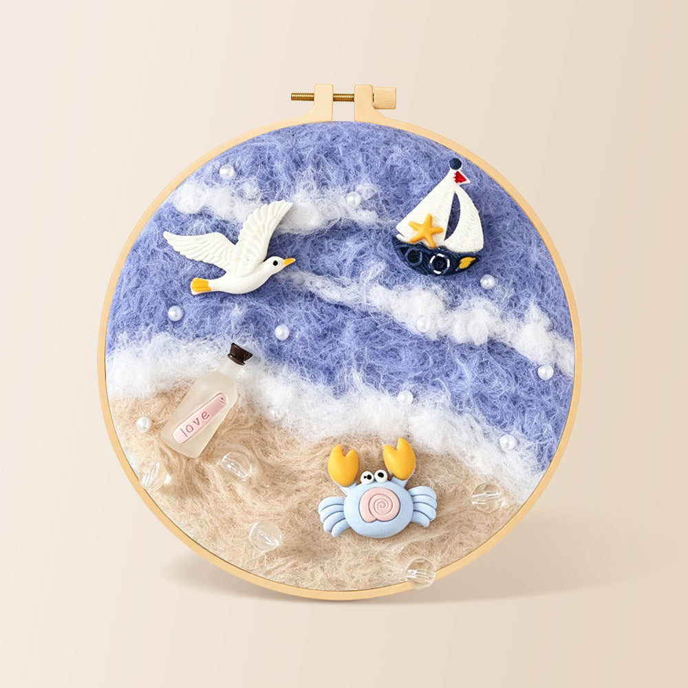 Seagull, crab and sailboat needle felting kit for beginners with a round wooden frame