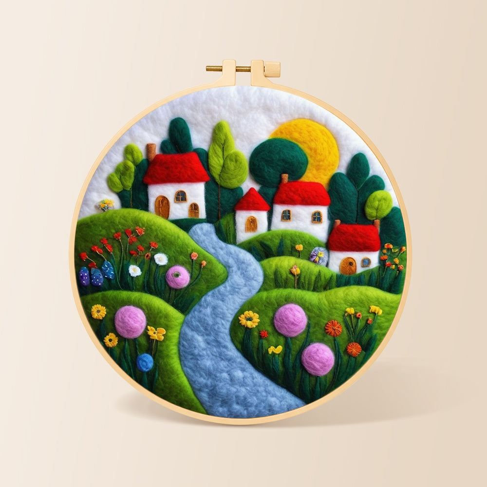 Serene blue river and red roof village needle felting kit for beginners with a round wooden frame