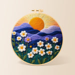 Serene mountain sunset and white daisies needle felting kit for beginners with a round wooden frame