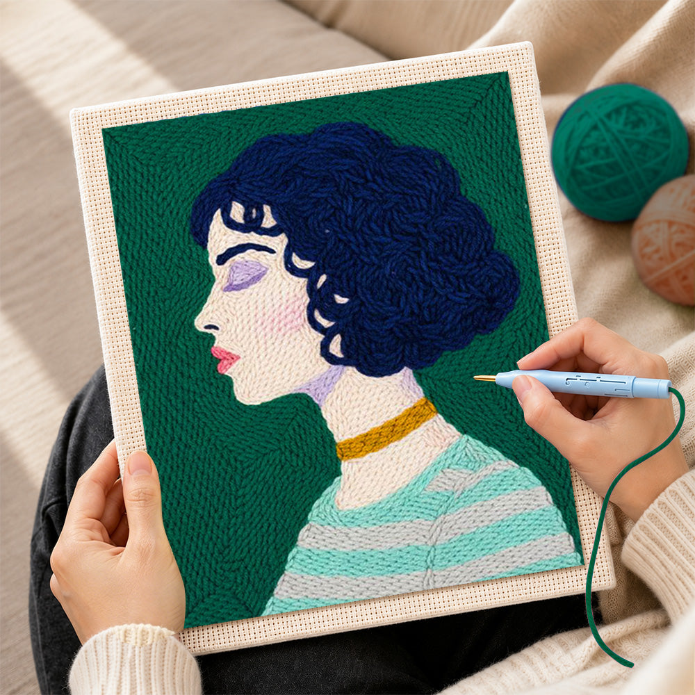 Creating handmade short curly hair woman with green striped sweater punch needle artwork