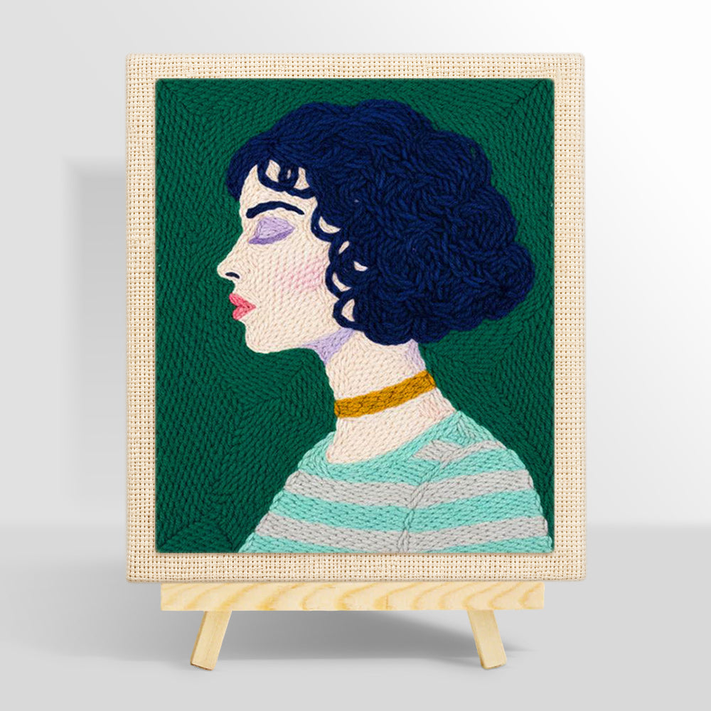 Short curly hair woman with green striped sweater punch needle kit for beginners