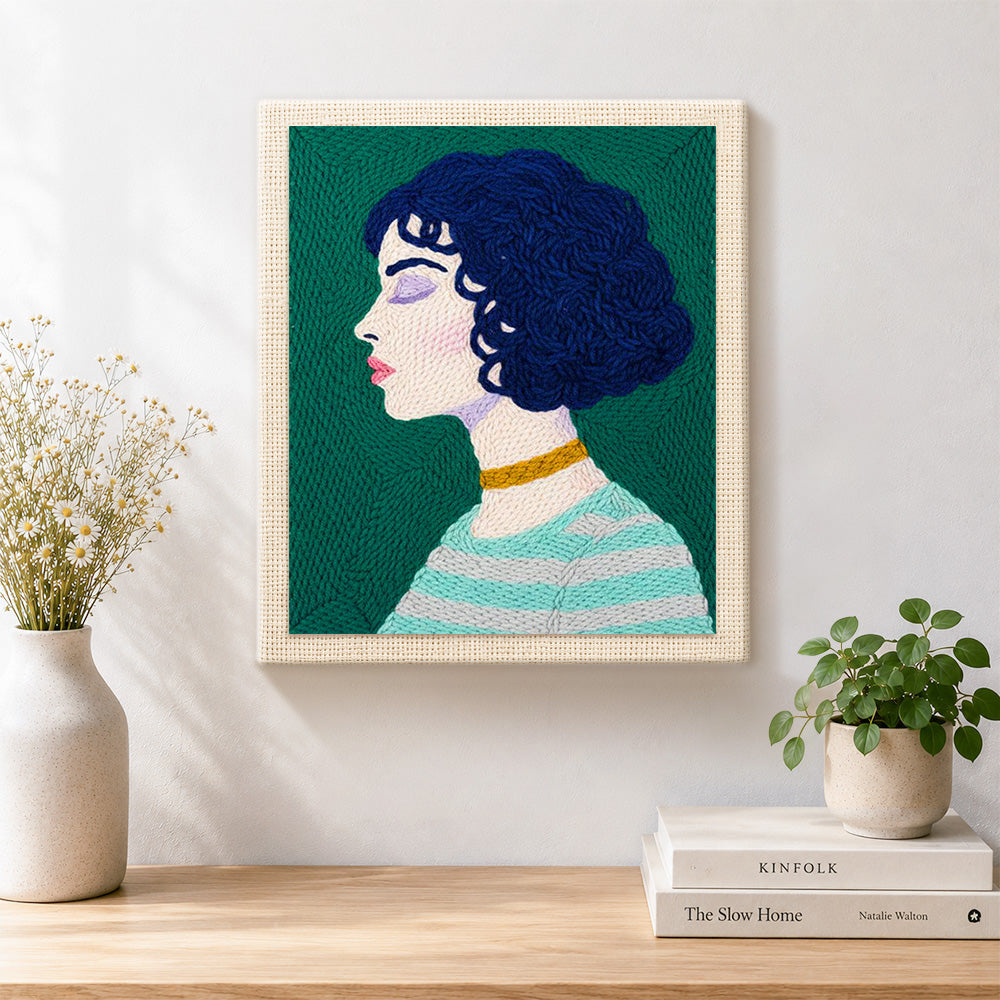 Finished short curly hair woman with green striped sweater artwork displayed on a wall