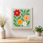 Finished simple and colourful wildflowers artwork displayed on a wall