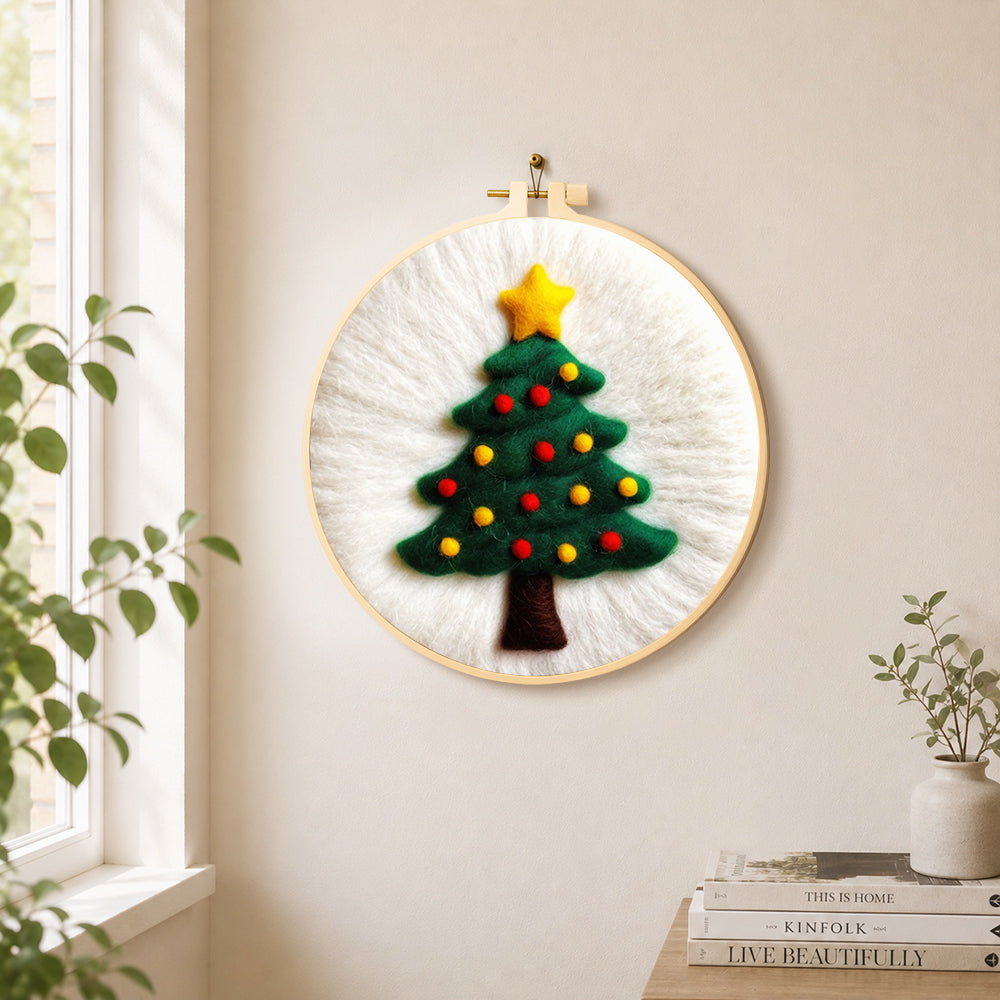Simple green christmas tree needle felt wall art displayed in a bright home interior