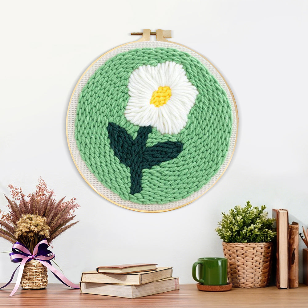 Finished single white daisy artwork displayed on a wall
