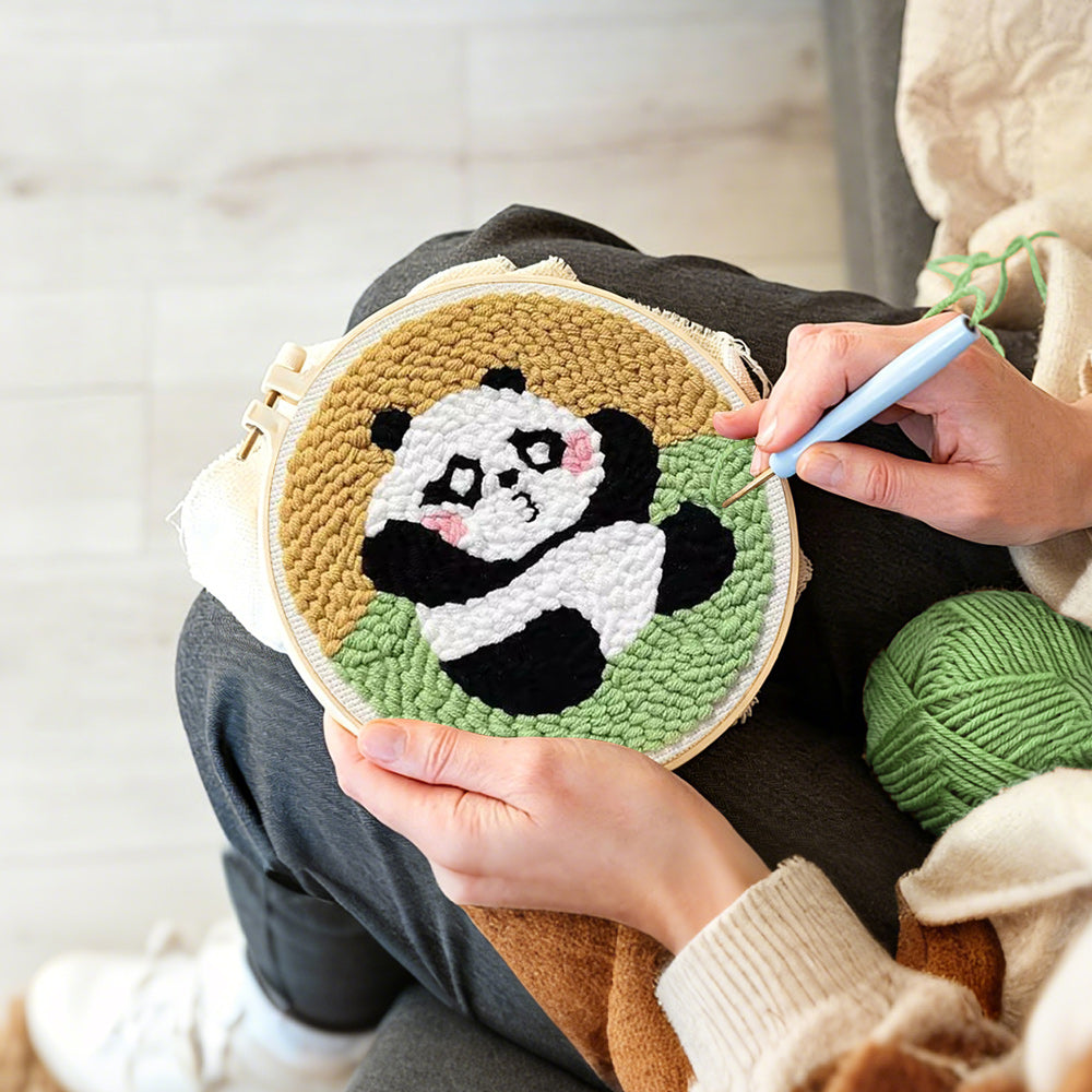 Creating handmade sitting cute panda punch needle artwork