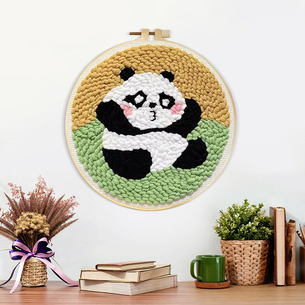 Finished sitting cute panda artwork displayed on a wall