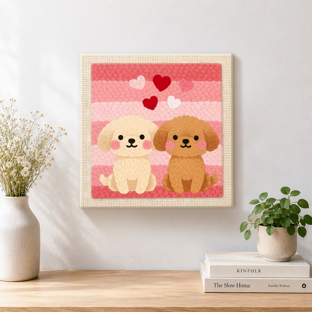 Finished sitting puppies and romantic hearts artwork displayed on a wall