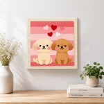 Finished sitting puppies and romantic hearts artwork displayed on a wall