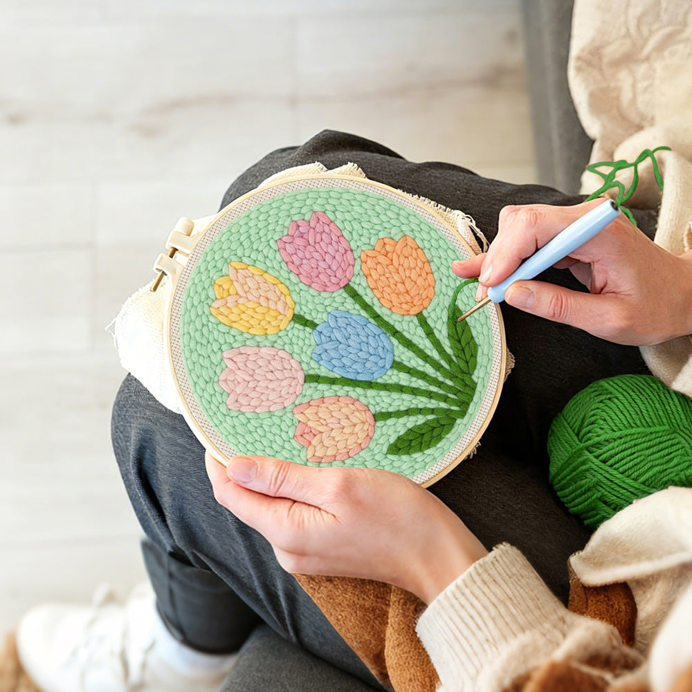 Creating handmade six pastel tulips punch needle artwork