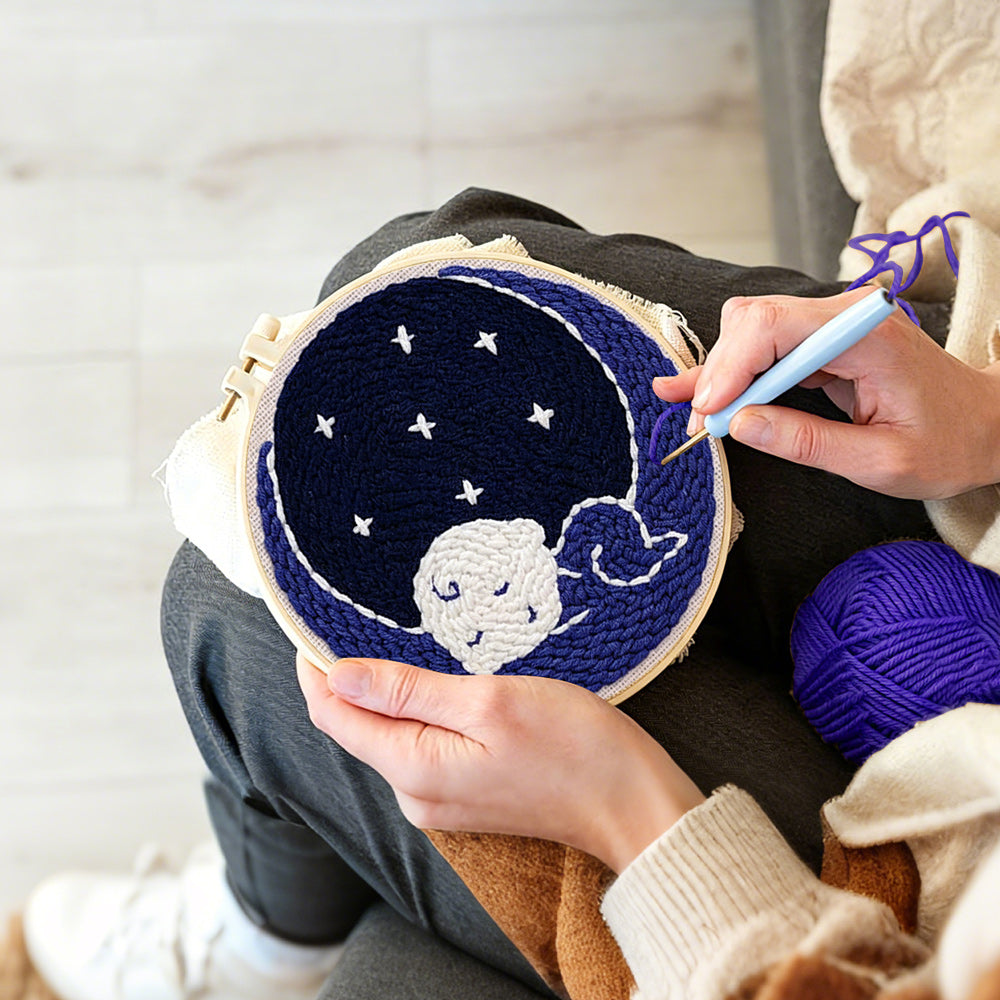 Creating handmade sleeping baby punch needle artwork