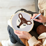 Creating handmade sleeping deer punch needle artwork
