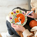 Creating handmade sleeping fox among the flowers punch needle artwork