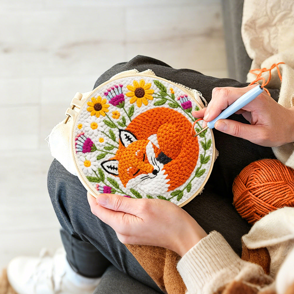 Creating handmade sleeping fox among the flowers punch needle artwork