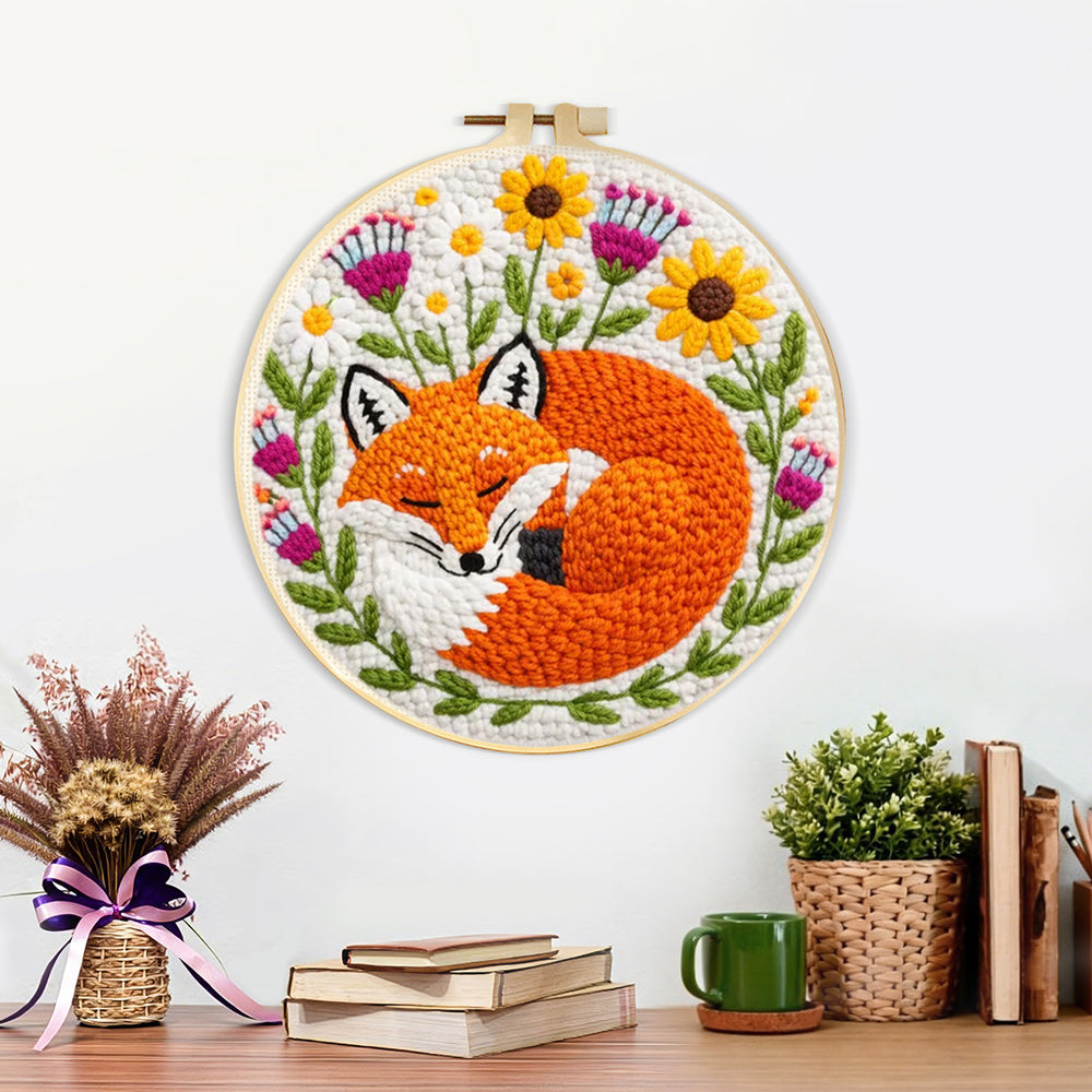 Finished sleeping fox among the flowers artwork displayed on a wall