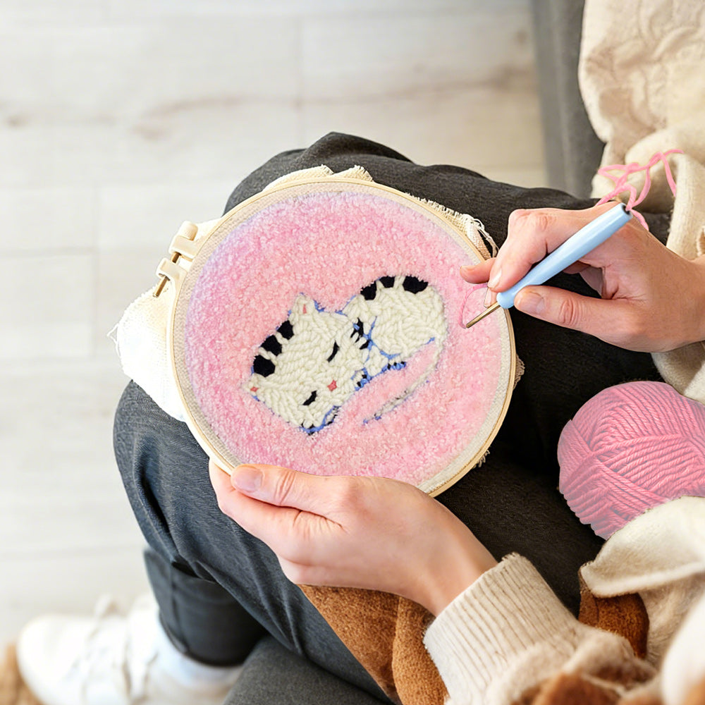 Creating handmade sleeping kitten punch needle artwork