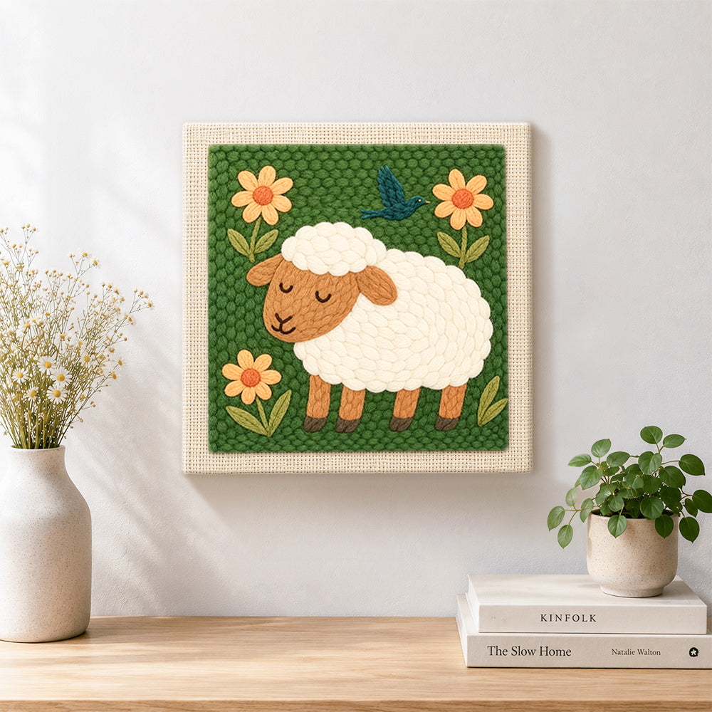 Finished sleeping sheep with flowers artwork displayed on a wall