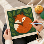 Creating handmade sleeping woodland fox punch needle artwork