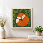 Finished sleeping woodland fox artwork displayed on a wall