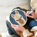 Creating handmade sleepy alpaca punch needle artwork