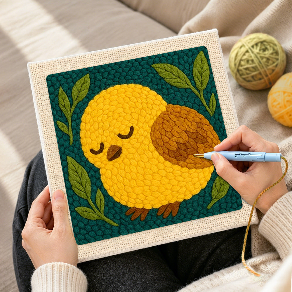 Creating handmade sleepy yellow bird punch needle artwork