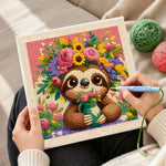 Creating handmade sloth with flower crown punch needle artwork