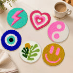 Smiley face and evil eye punch needle coasters used for home decoration