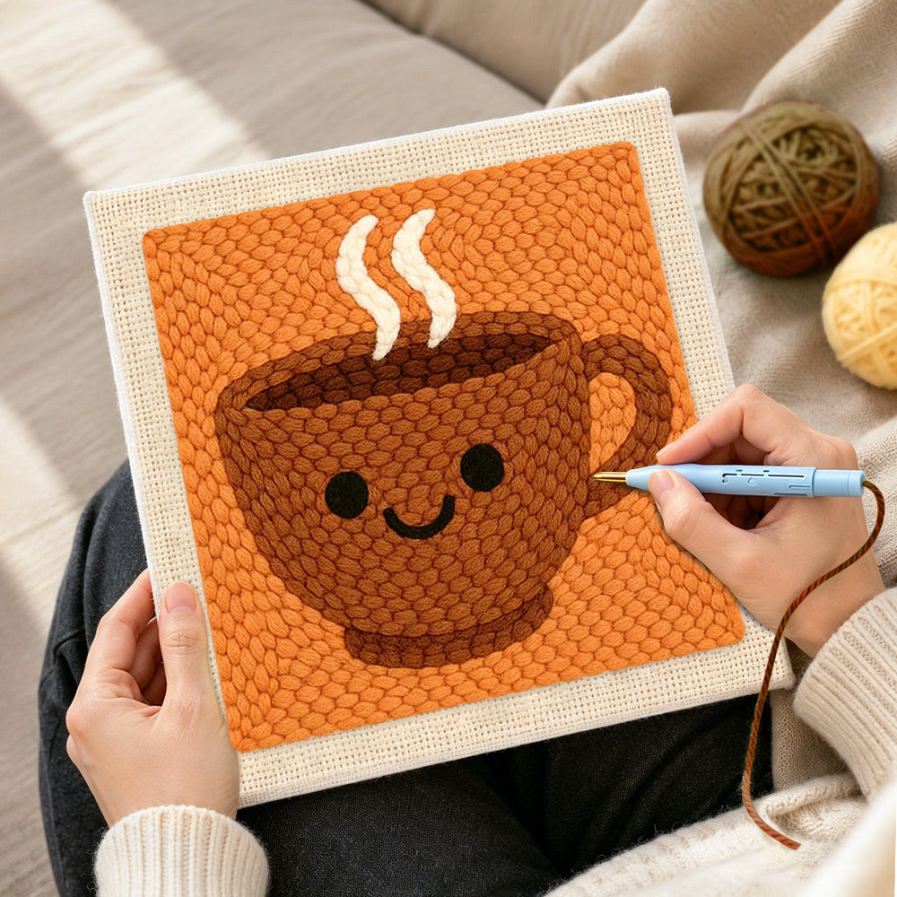 Creating handmade smiley face coffee cup punch needle artwork