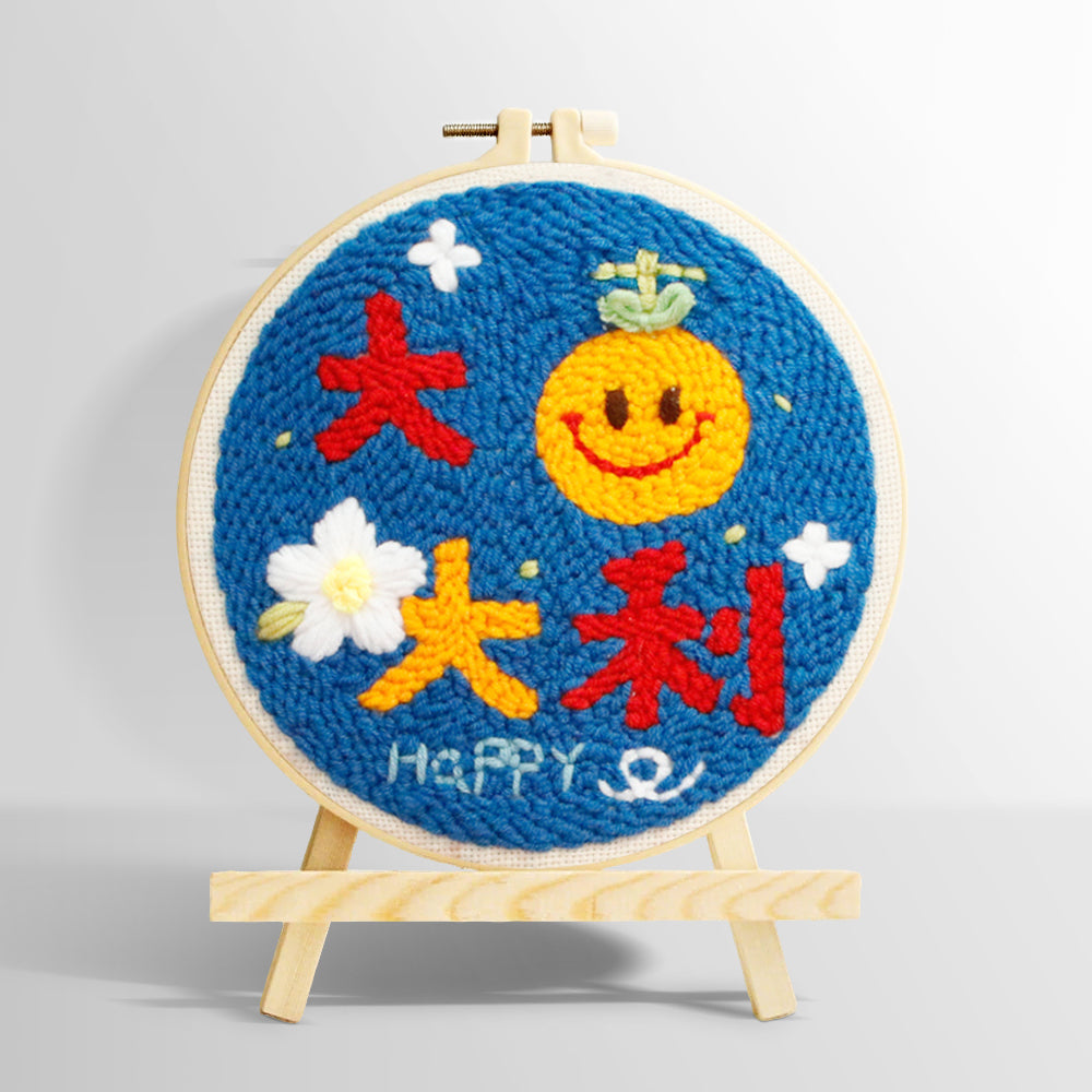 Smiley orange with "best of luck" text punch needle kit for beginners