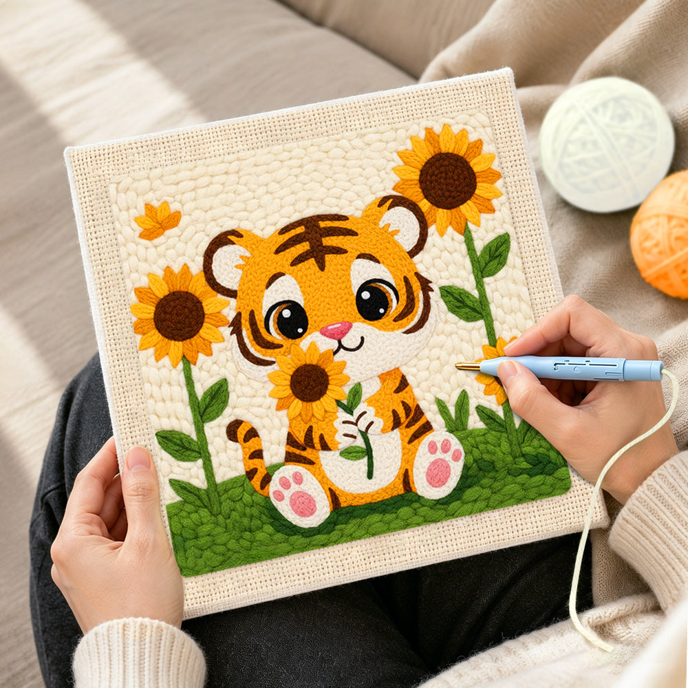 Creating handmade smiling baby tiger with sunflowers punch needle artwork